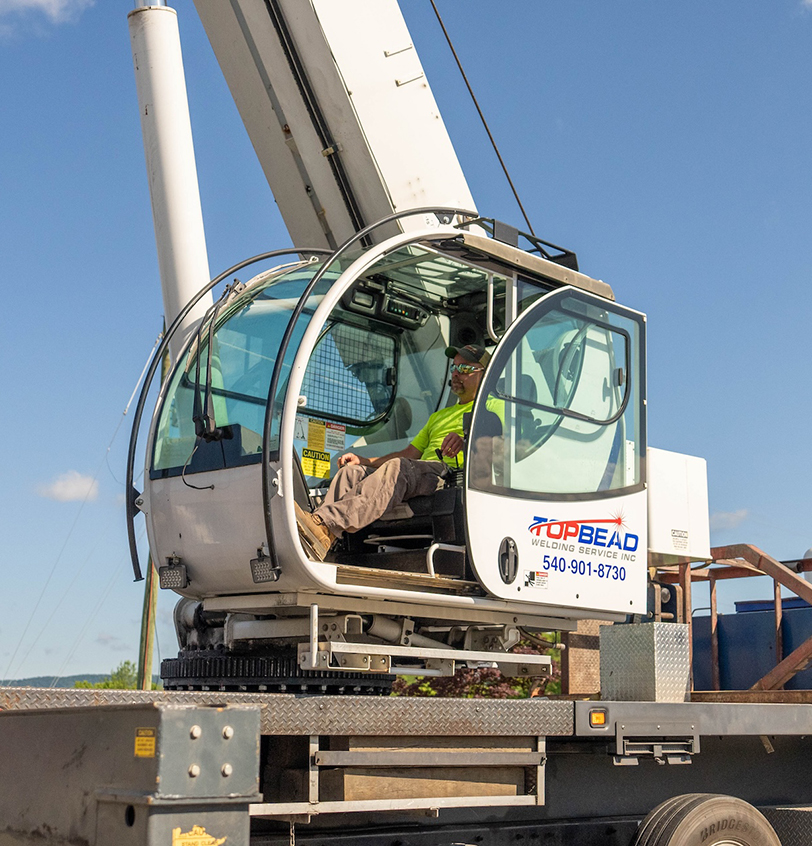 Crane Operator focused on maneuvering crane on a jobsite