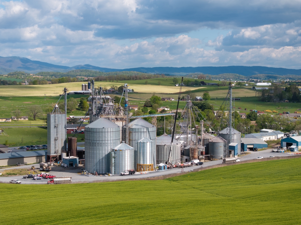 drone shot of metal silos