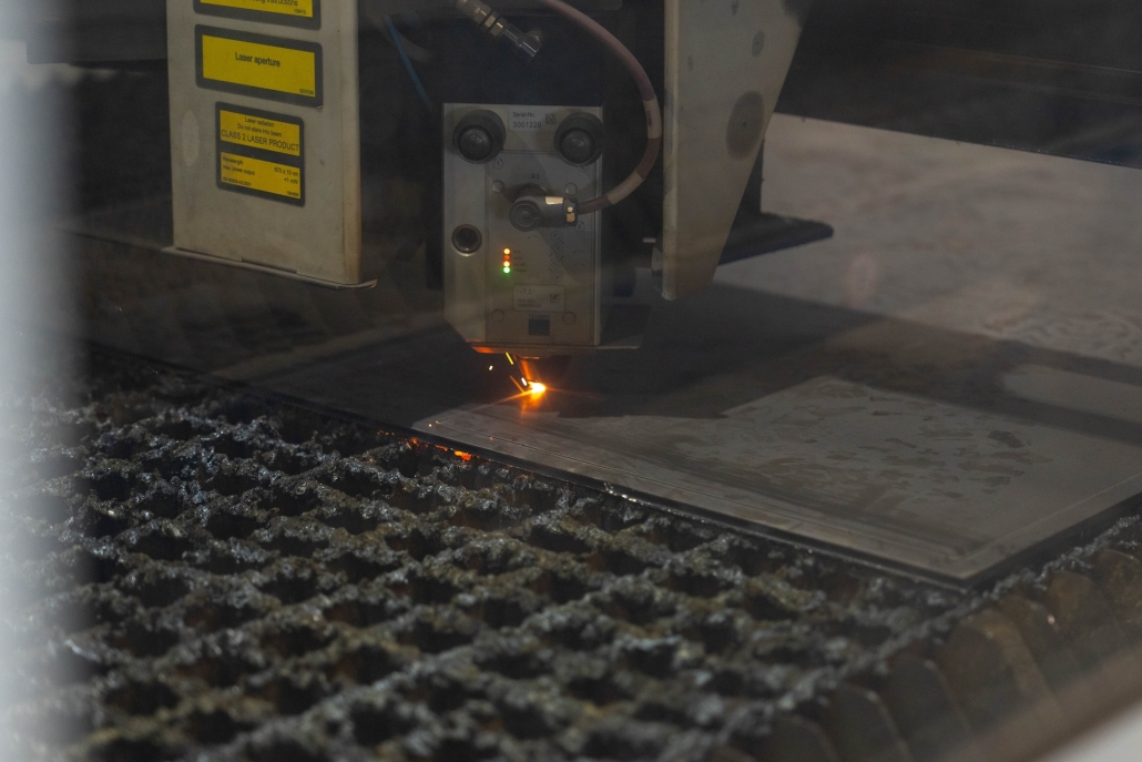 closeup of machine cutting through metal